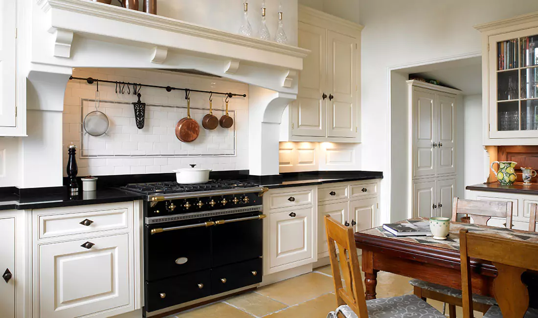 Cottage kitchen with retro style black oven.