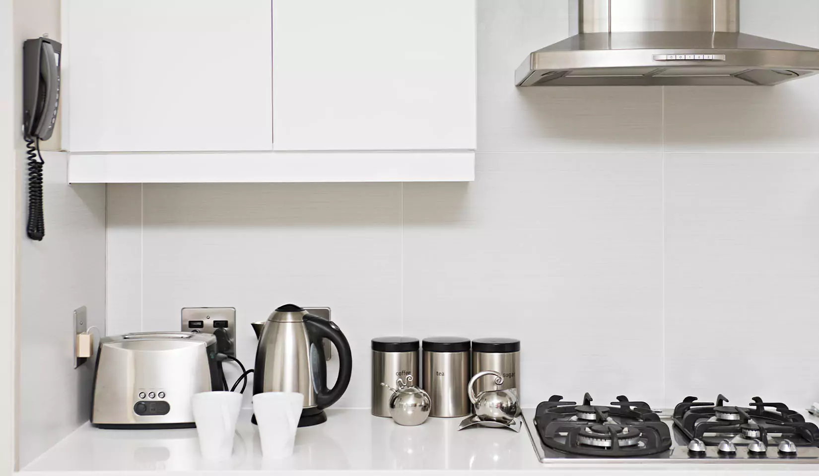 Kitchen cabinets pulled away from the walls.