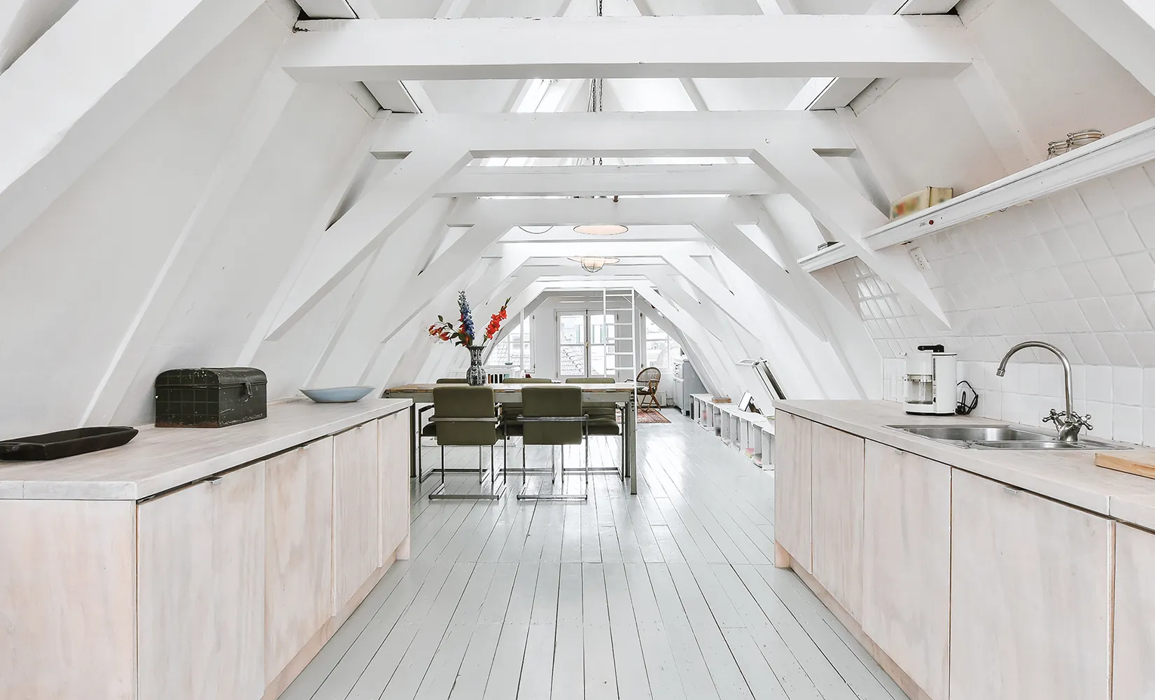 Galley kitchen with large skylight.