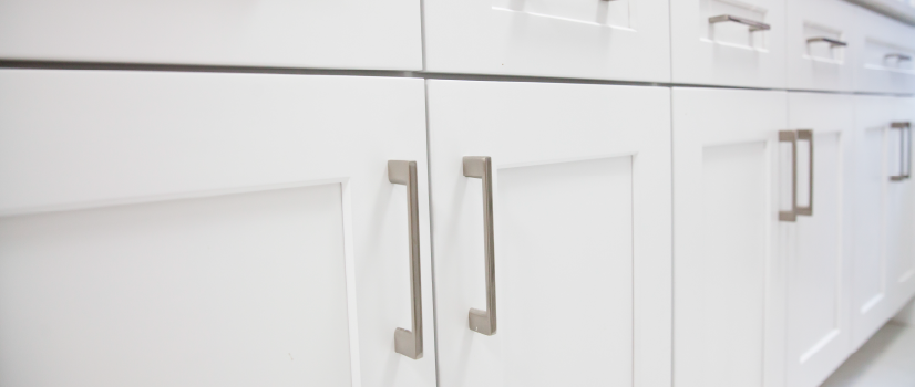 Brand new white shaker cabinets with nickel handles.