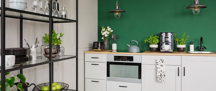 3d Rendering Of A Fresh And Vibrant Green Kitchen Featuring Black