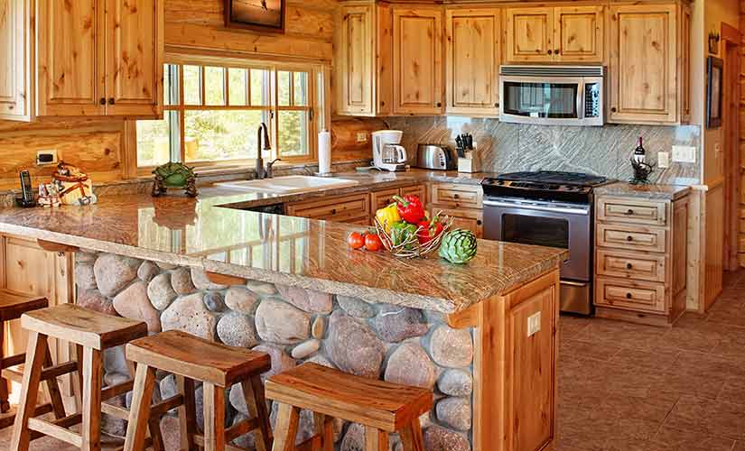 kitchen with natural wood backsplash and cabinets