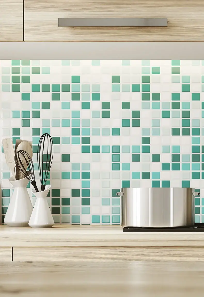 Mosaic tile kitchen backsplash with blue, green, and teal square patterns.