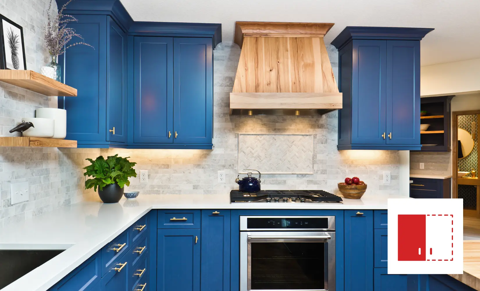 Kitchen with navy blue semi-custom cabinets.