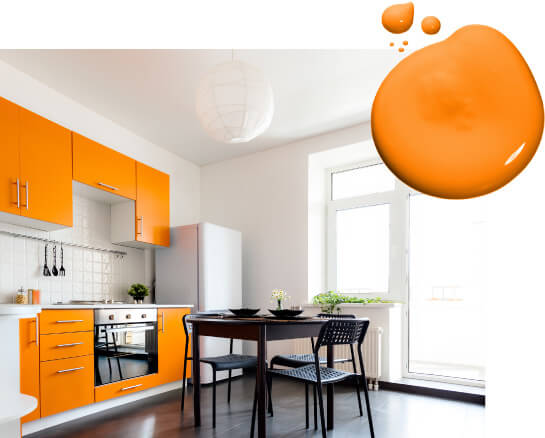 Kitchen with bright orange cabinets with modern stainless steel hardware and subway tile backsplash.