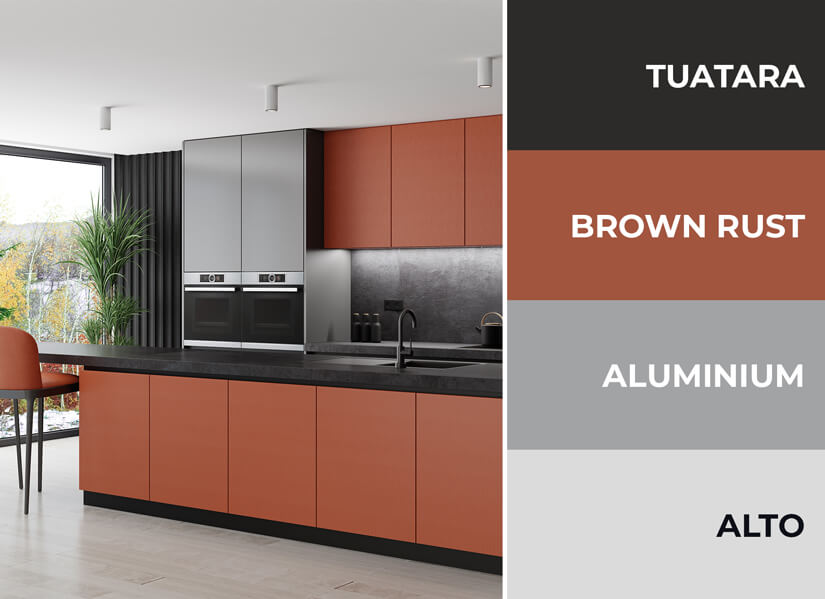 Modern kitchen with rust, black and gray color scheme.