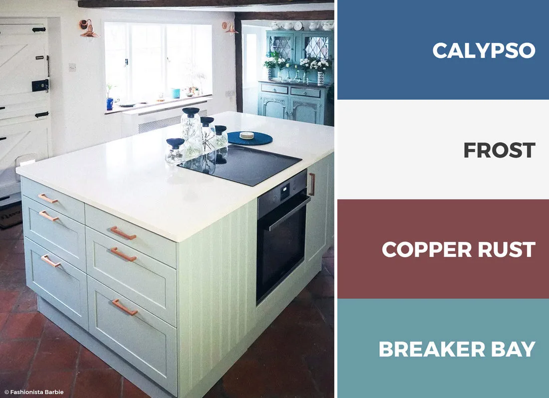This blue and red kitchen color scheme creates a charming eclectic style.