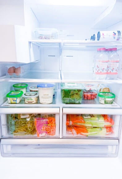 Fridge organization with containers.