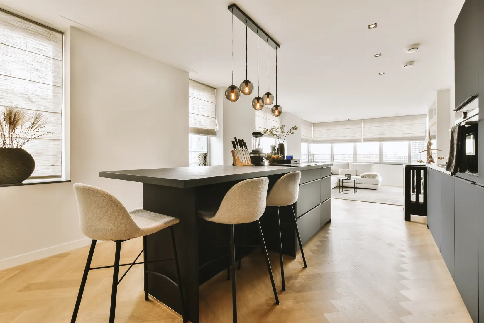 Modern kitchen with communal bar seating.