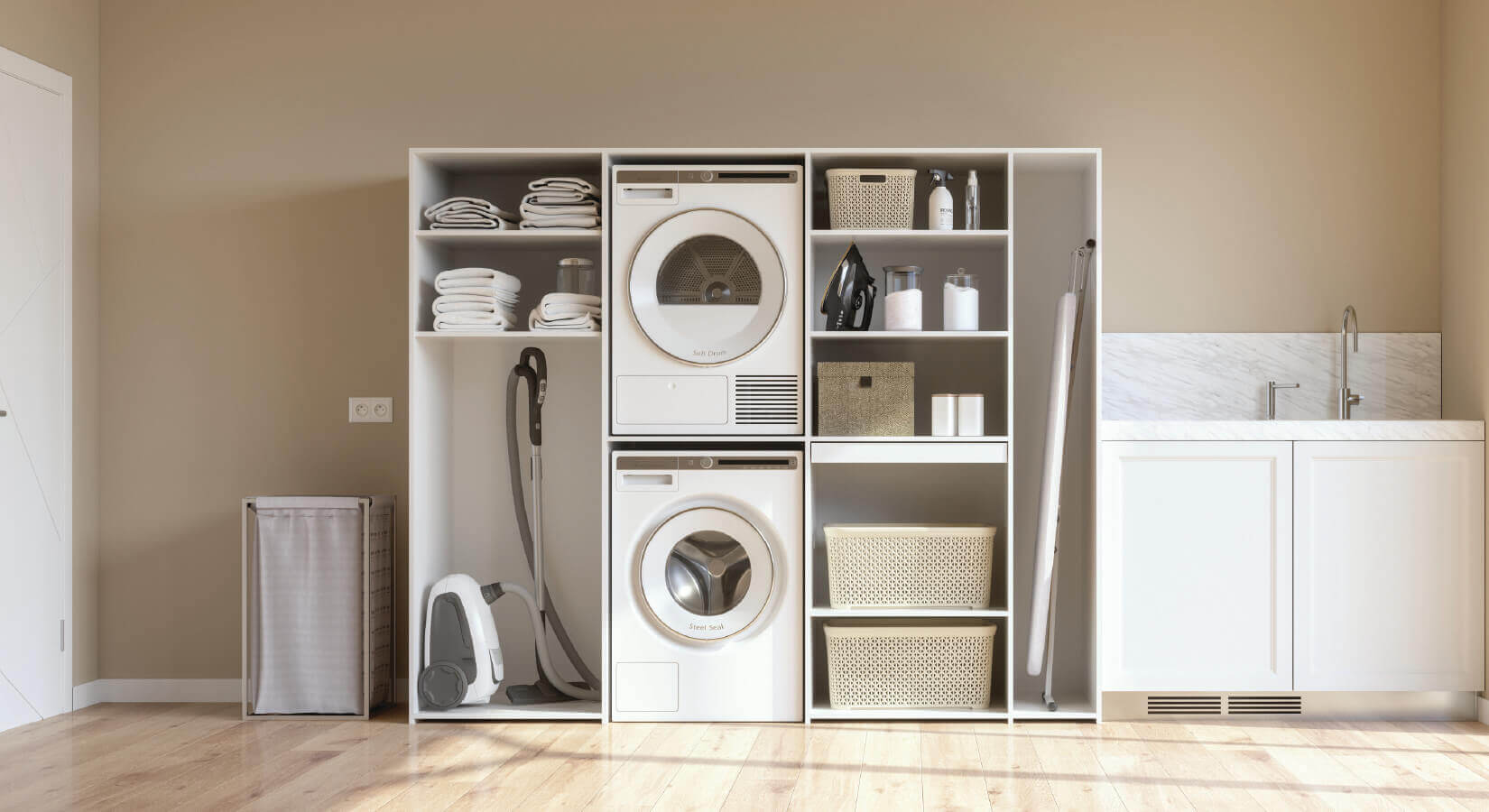 Washer, dryer, vacuum, and linens stacked in open cabinet unit.