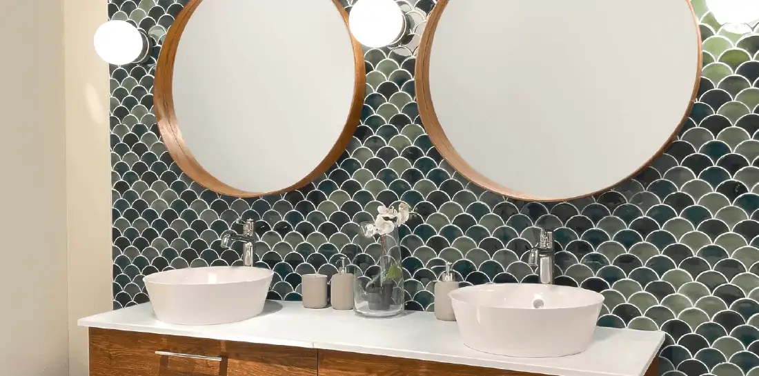 Mid-Century Modern bathroom with statement fish scale shaped light green tile.