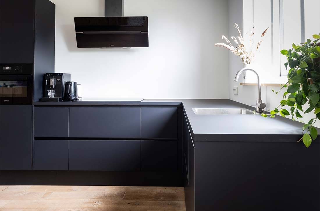 Sleek black kitchen cabinets.
