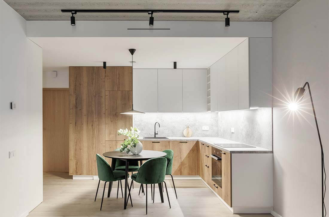 Natural wood and sleek white kitchen.