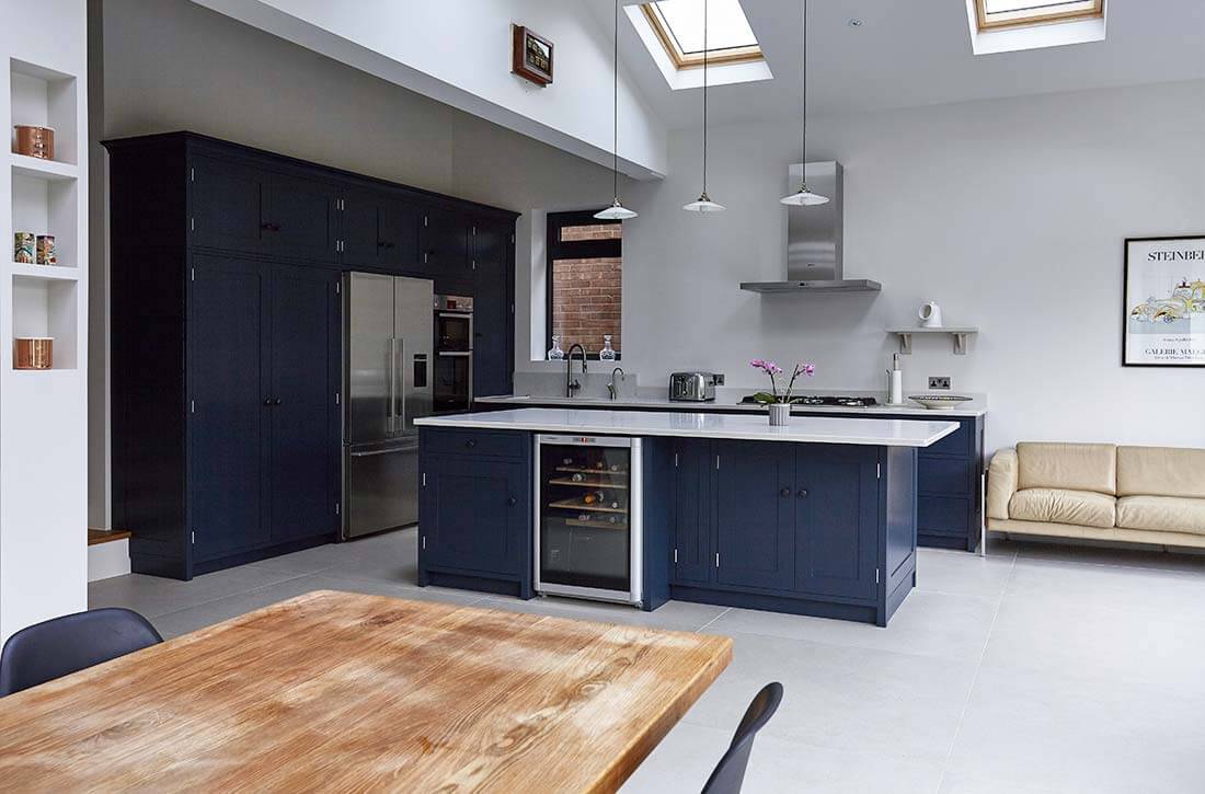 Skylight in navy blue kitchen.