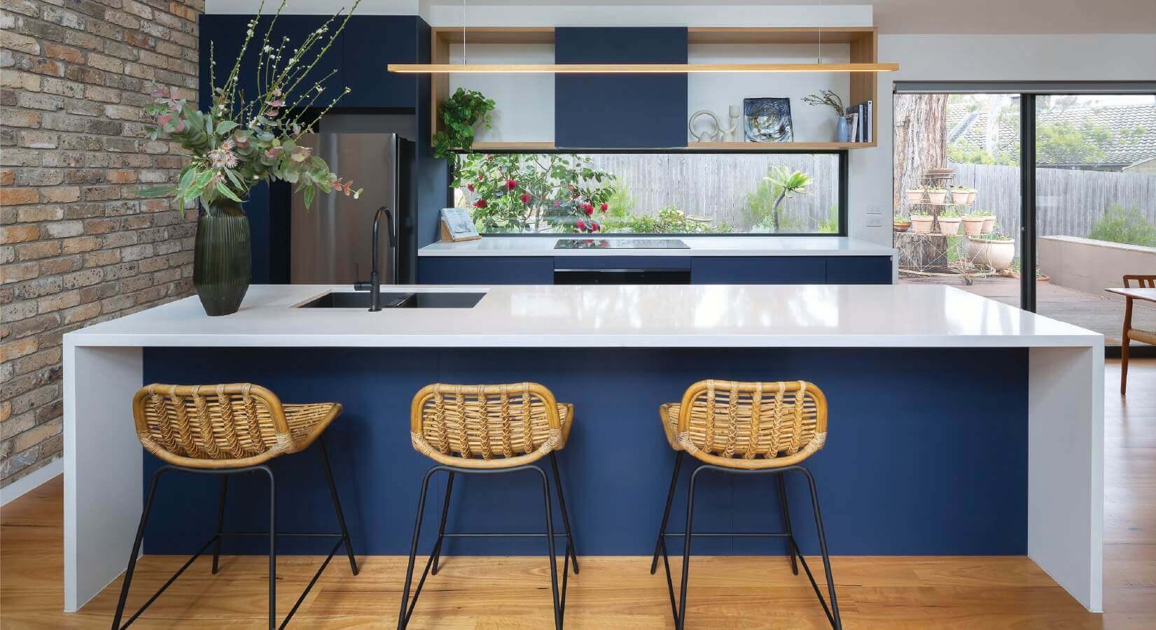 Before and After: Brass and Navy Pair Nicely in the Kitchen