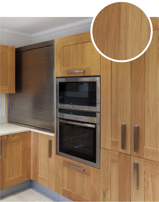 Natural oak wood cabinets with pale honey color. 