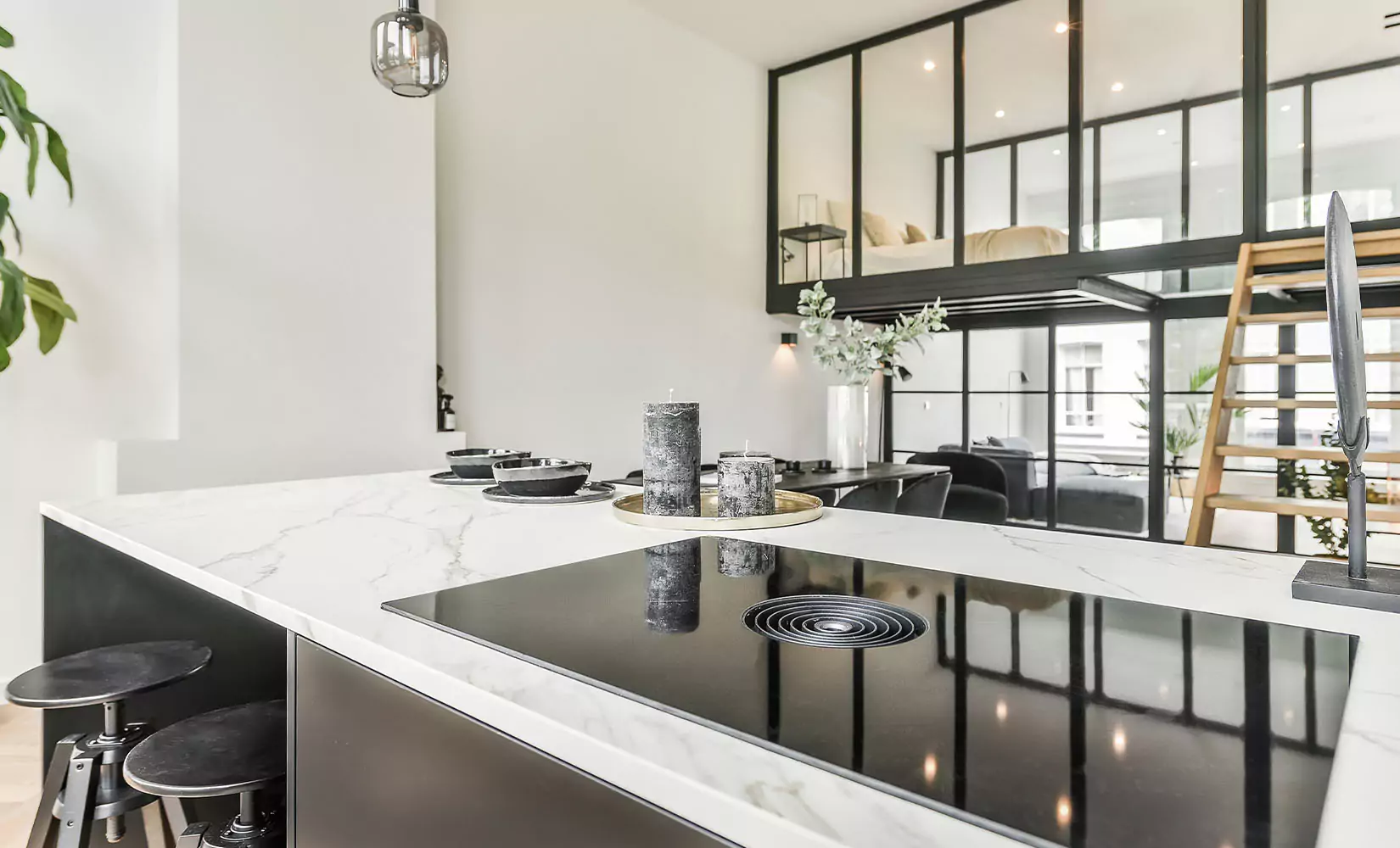 Large kitchen island with a glass range.