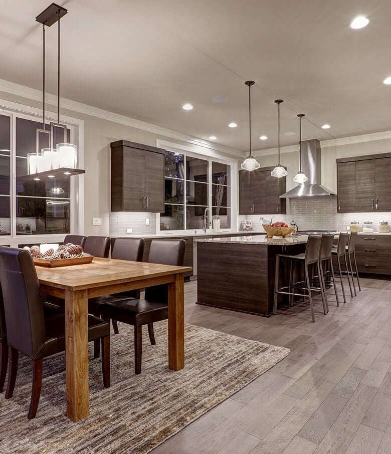 open concept kitchen with dark kitchen cabinets