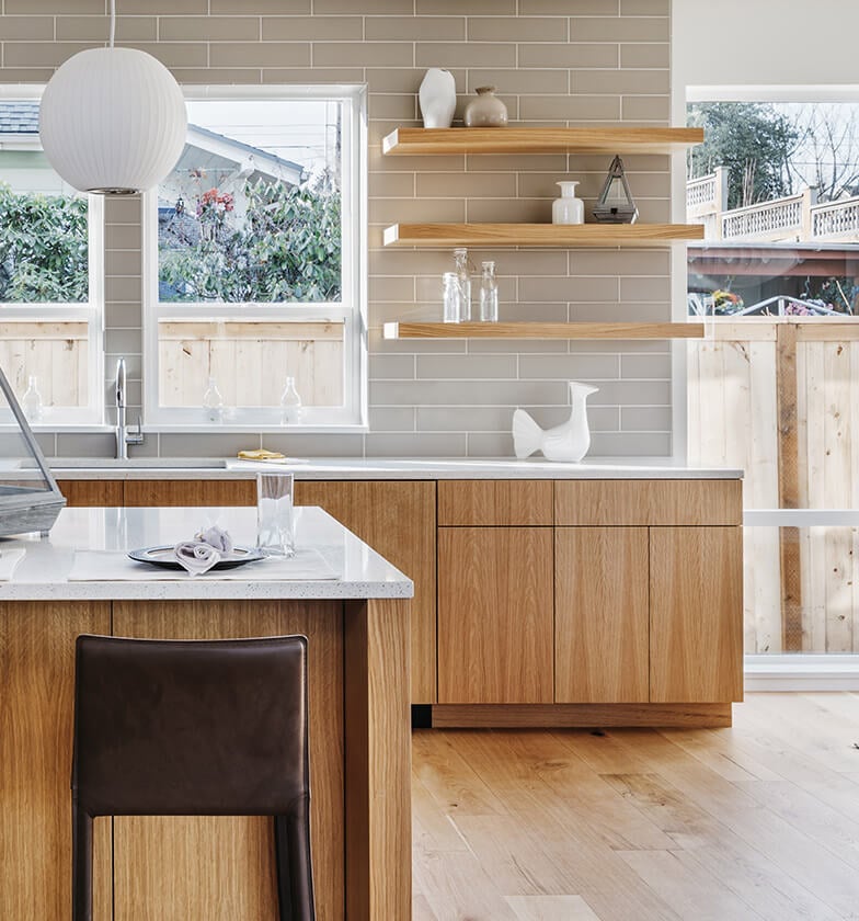 Modern, minimalist kitchen with wood open shelving.