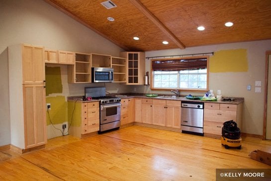Wood kitchen cabinets with high ceilings