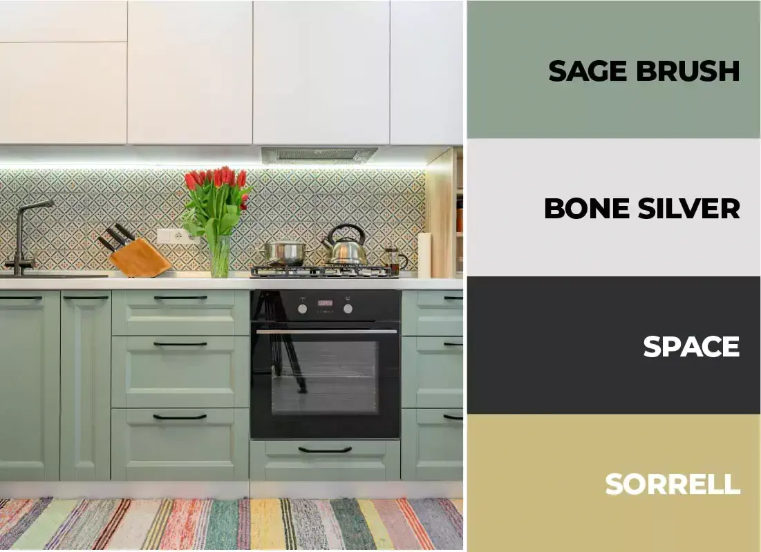 Neutral kitchen with sage green cabinets.