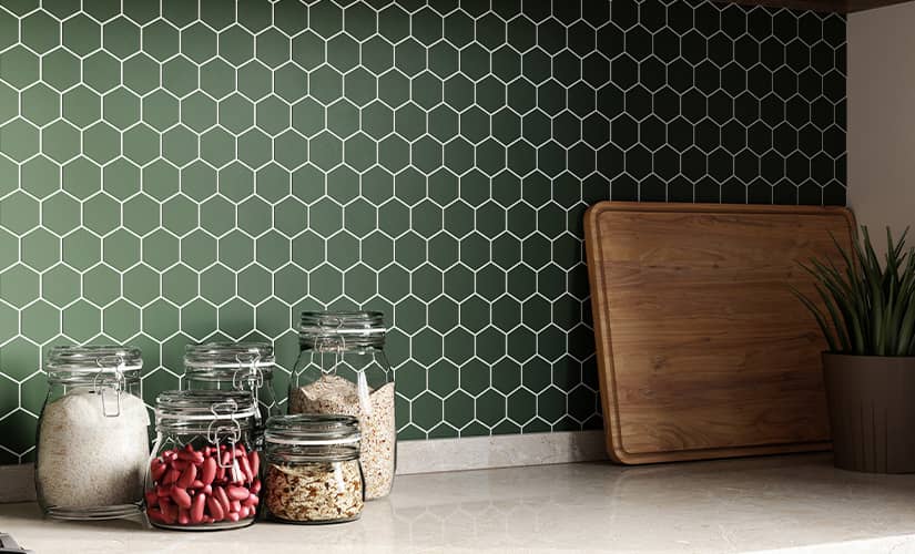Honeycomb green tiled kitchen backsplash.