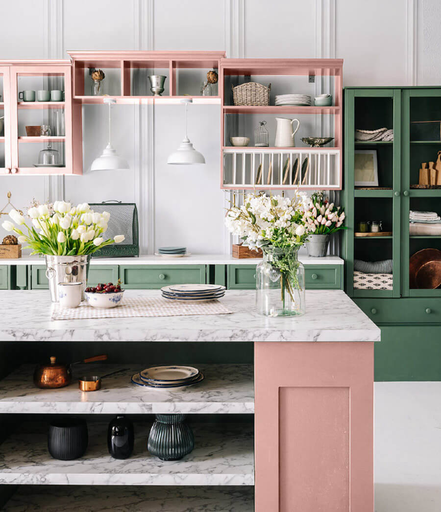 Pink and green two tone kitchen.