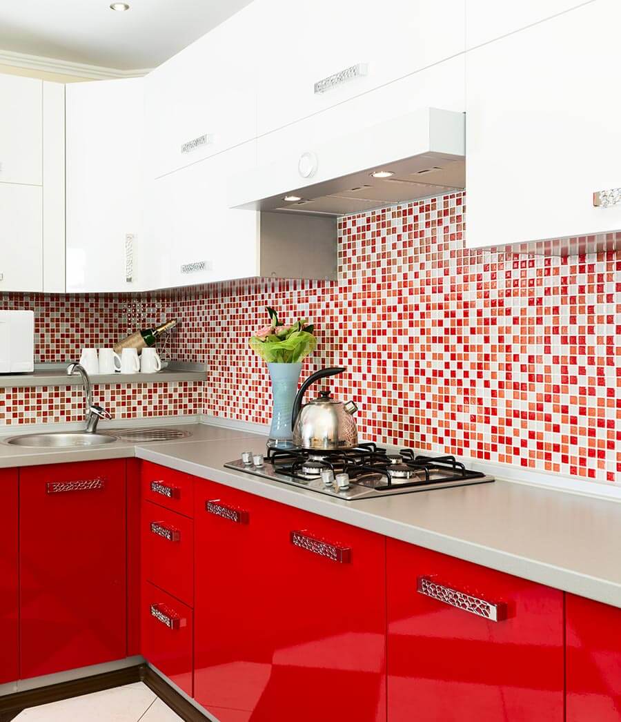 Two tone kitchen cabinets in red and white.