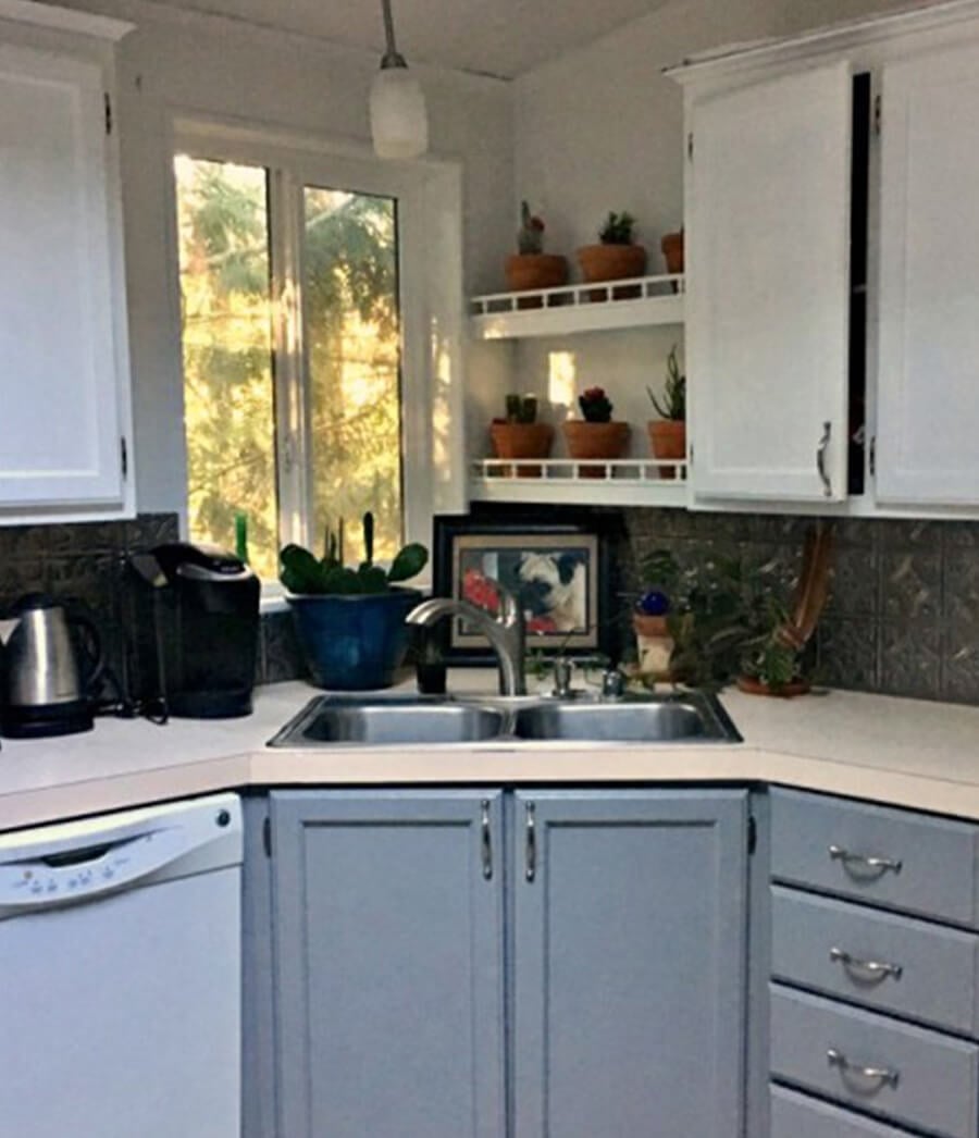Two tone kitchen cabinets with soft gray.