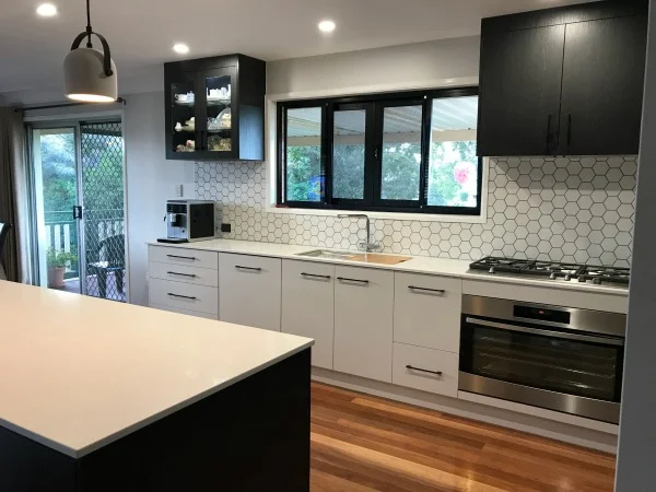 Two tone black and white kitchen cabinets