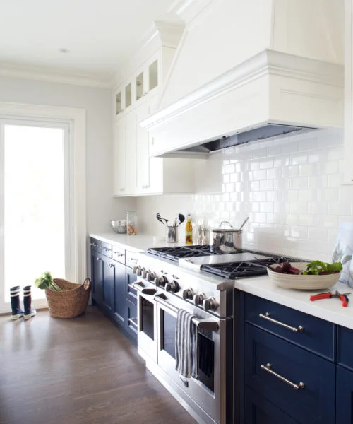 Two tone kitchen cabinets in bold blue