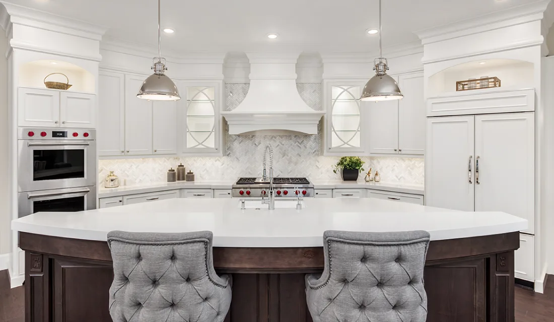 Kitchen with white custom cabinets.