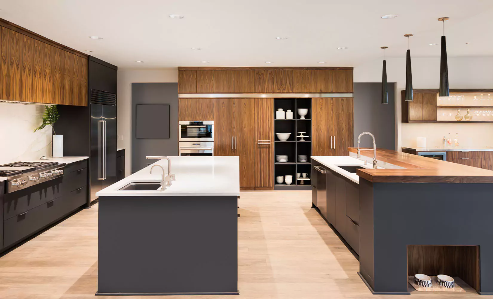 Large open-concept kitchen with two kitchen islands.