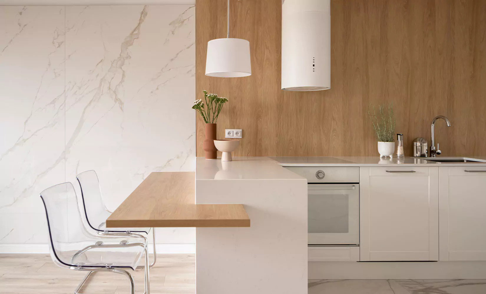 U-shaped kitchen with tiered peninsula.