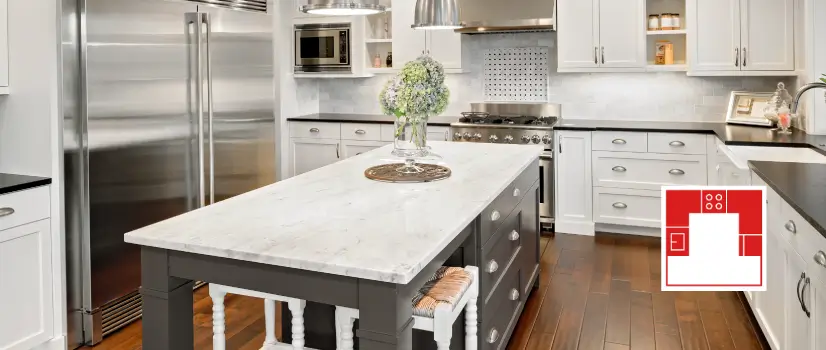 Large U-shaped kitchen with kitchen island in middle.